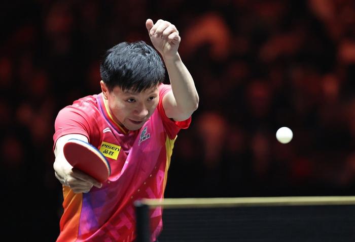 林诗栋力克马龙夺男单冠军 国乒包揽冠亚军